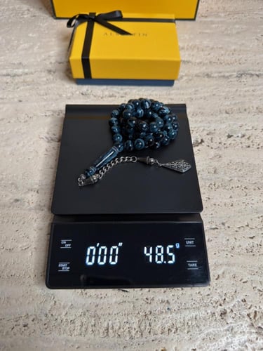 سبحة ازرق غامق مشخط رخامي بكلايت مع شكة استنلس است...