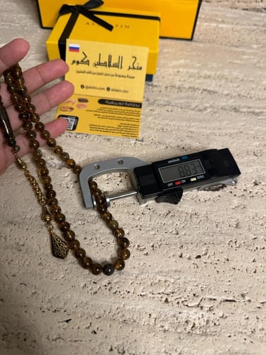 سبحة كهرمان حر شوائب طبيعية مذهب مع شكة ذهبي