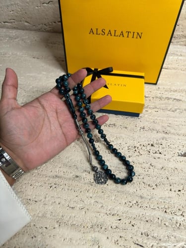 سبحة ازرق غامق مشخط رخامي بكلايت مع طربزونه فضة.