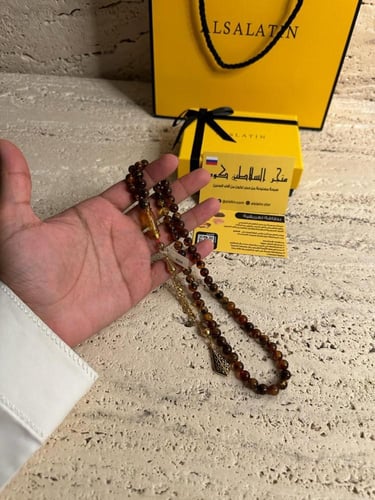 سبحه كهرمان حر شوائب طبيعية مع استنلس استيل نفس ال...