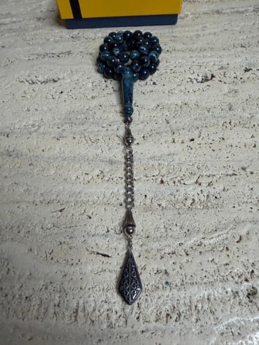 سبحة ازرق غامق مشخط رخامي بكلايت مع شكة استنلس است...