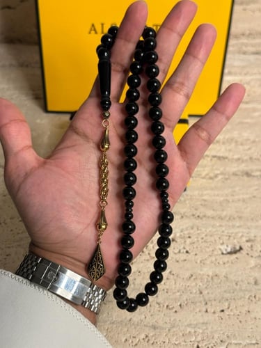 سبحة بكلايت اسود مع شكة ذهبيه من استنلس استيل نفس...