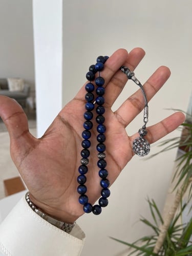 سبحة من حجر عين النمر ازرق مع طربزونة فضة وفواصل ف...