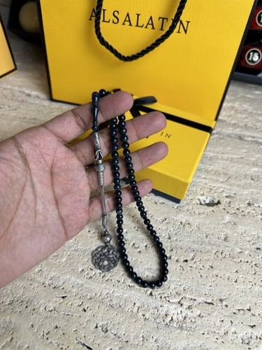 سبحة ازرق غامق بكلايت مع طربزونه فضة.66