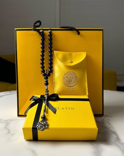 سبحة من حجر عين النمر ازرق مع طربزونة فضة وفواصل ف...