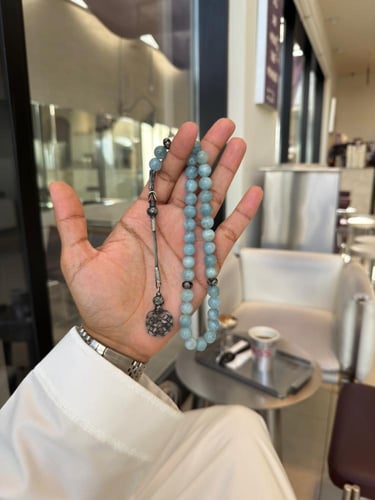 سبحة مصنوعة من حجر الأكوامارين الكريم مع طربزونة ع...