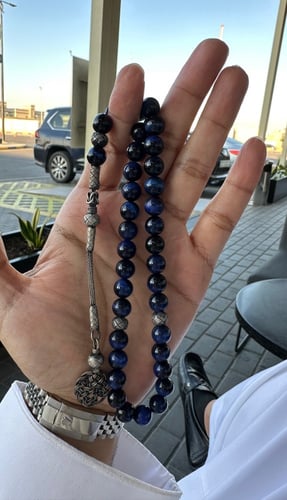 سبحة من حجر عين النمر ازرق مع طربزونة فضة وفواصل ف...