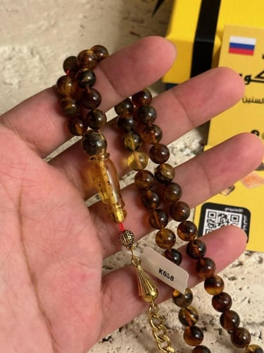 سبحه كهرمان حر شوائب طبيعية مع استنلس استيل نفس ال...