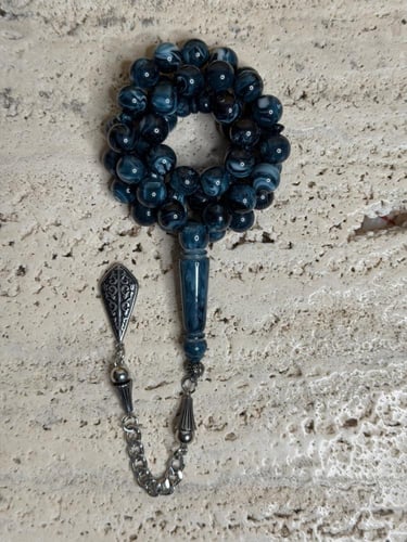 سبحة ازرق غامق مشخط رخامي بكلايت مع شكة استنلس است...