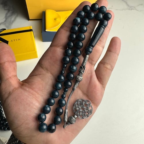 سبحة ازرق رخامي 33 خرزه غامق مشخط رخامي بكلايت مع...