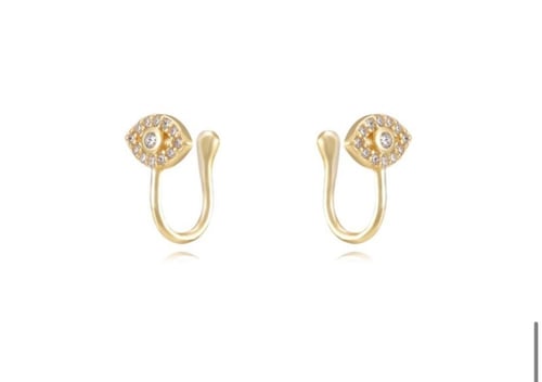 مجموعة اقراط ذهبية