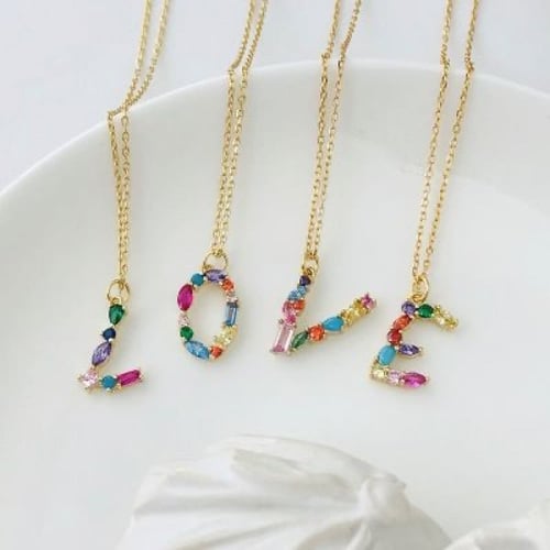 سلسال حرف X مرصع بالأحجار الملونة ومطلي بالذهب من...