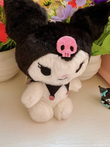 ميداليه كورومي اسود بحامل مفاتيح ومشبك