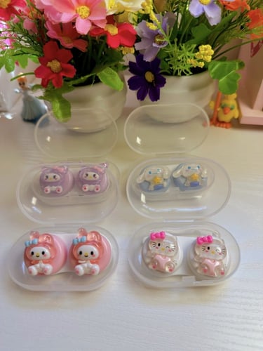 علبة عدسات مع ملقط ومساعد هيلوكيتي