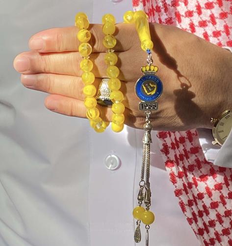 سبحة بكلايت لون أصفر نادي النصر بتصميم كركوشة مطلي...