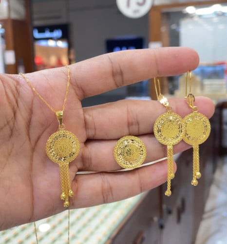 نص طقم ذهب عيار 21 وزن 10.23