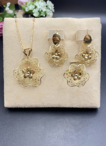 نص طقم ذهب عيار 18الوزن 15.58