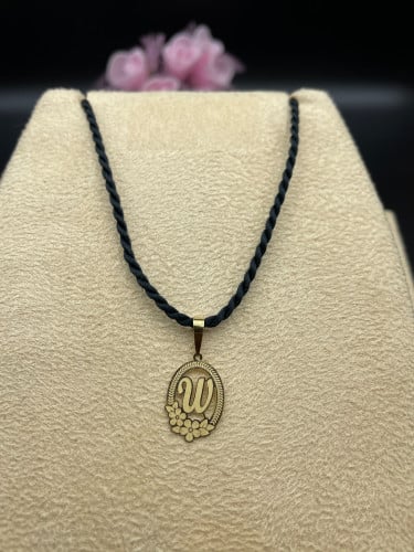 حرف W ذهب عيار 18 الوزن التقريبي 0.25