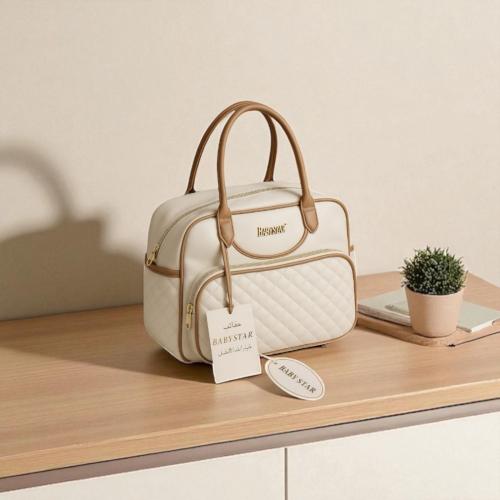 شنطةموااليد جلد للامهات