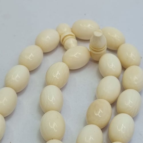 مسباح عاج فاخر ومنقوش