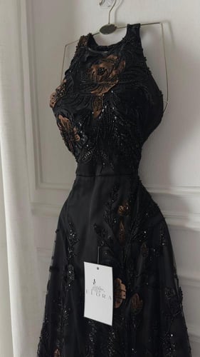 فستان اسود سهره راقي