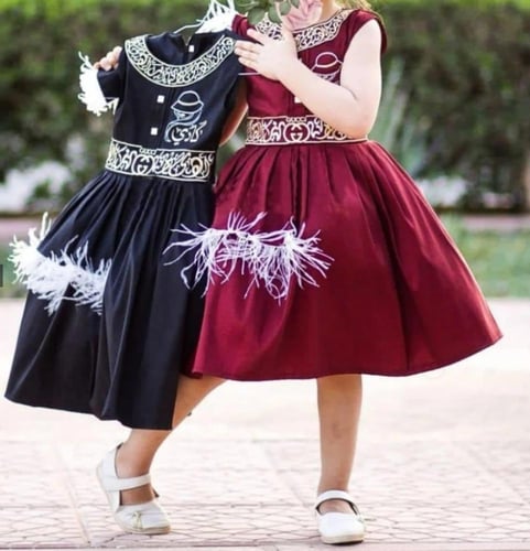 فستان اطفال بالاسم للعيد