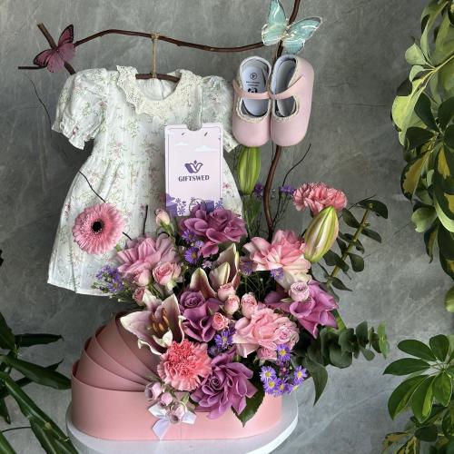 Elegant prayer ribbon flower arrangement for the n...