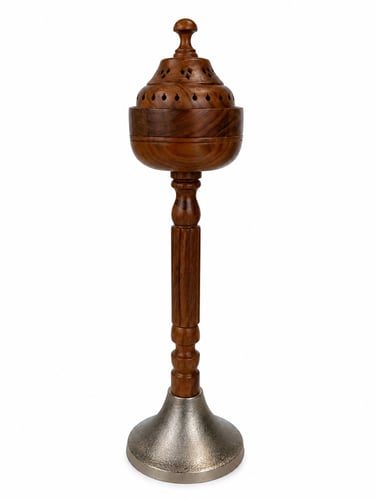 Wooden incense holder in the middle with a silver...