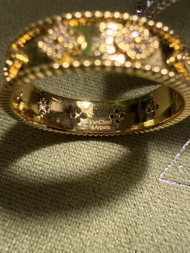 خاتم Van cleef لونين( ذهبي - فضي )