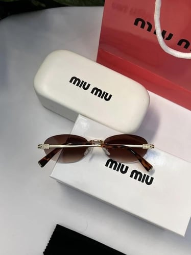 نظارة miu miu أطار ذهبي تايقر عدسة بني