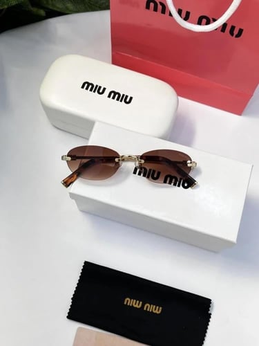 نظارة miu miu أطار ذهبي تايقر عدسة بني