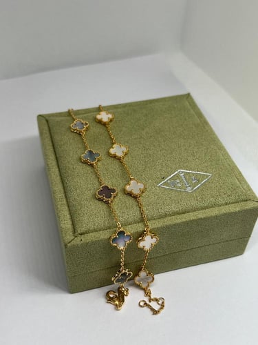 أسوارة Van cleef ذهبي وردة