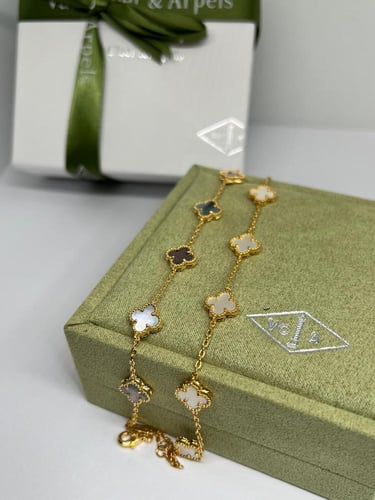 أسوارة Van cleef ذهبي وردة