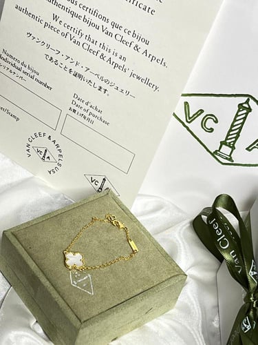 إسوارة Van cleef ذهبي _صدفي