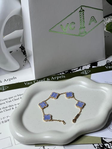إسوارة Van cleef ذهبي -فيروزي مميز