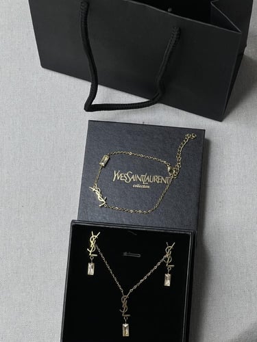 طقم سان لوران ذهبي