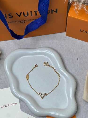 إسوارة LOUIS VUITTON معدن ذهبي