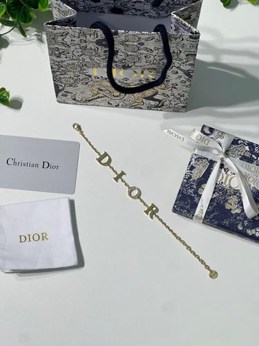أسوارة Dior معدن ذهبي