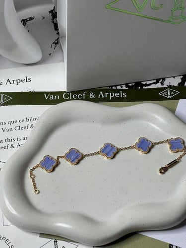 إسوارة Van cleef ذهبي -فيروزي مميز