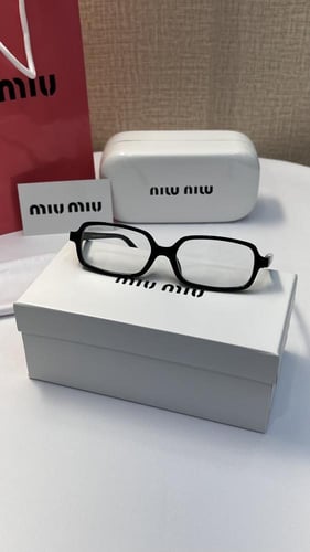 نظارة miu miu أطار أسود - عدسة شفافة