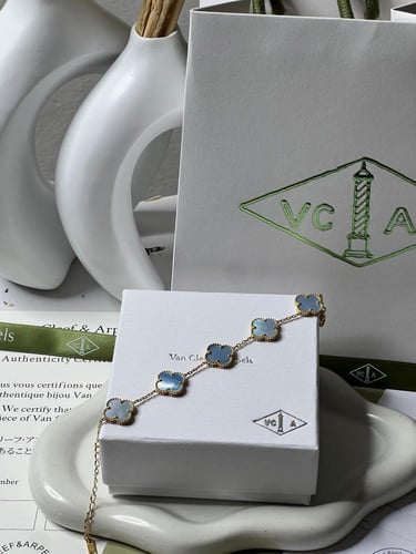إسوارة Van cleef ذهبي -فيروزي