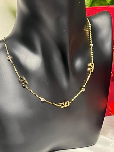 سلسال مع حلق VALENTINO فصوص