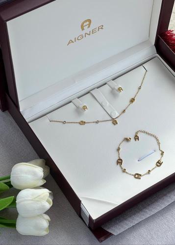 طقم AIGNER ذهبي