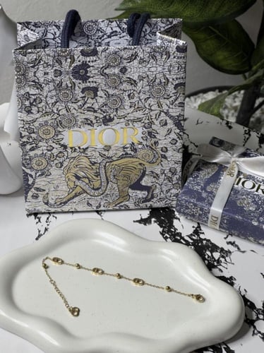 إسوارة Christian Dior ذهبي