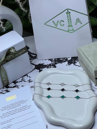 أسوارة Van cleef فضي وردة