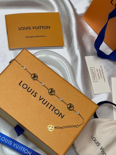 إسوارة LOUIS VUITTON معدن ذهبي صدفي