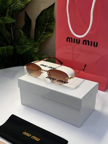 نظارة miu miu أطار ذهبي تايقر عدسة بني