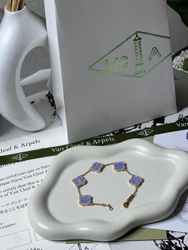 إسوارة Van cleef ذهبي -فيروزي مميز