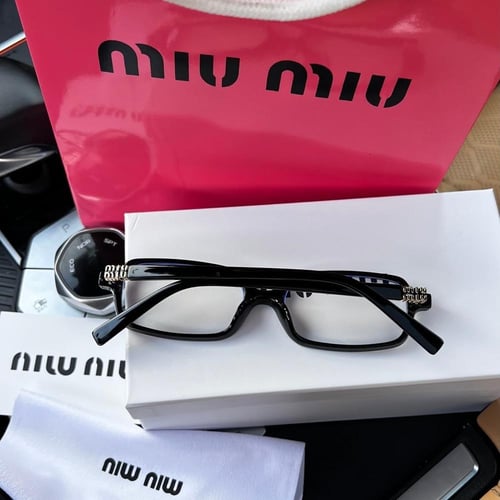 نظارة miu miu أطار أسود - عدسة شفافة