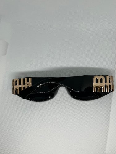 نظارة MIU MIU
